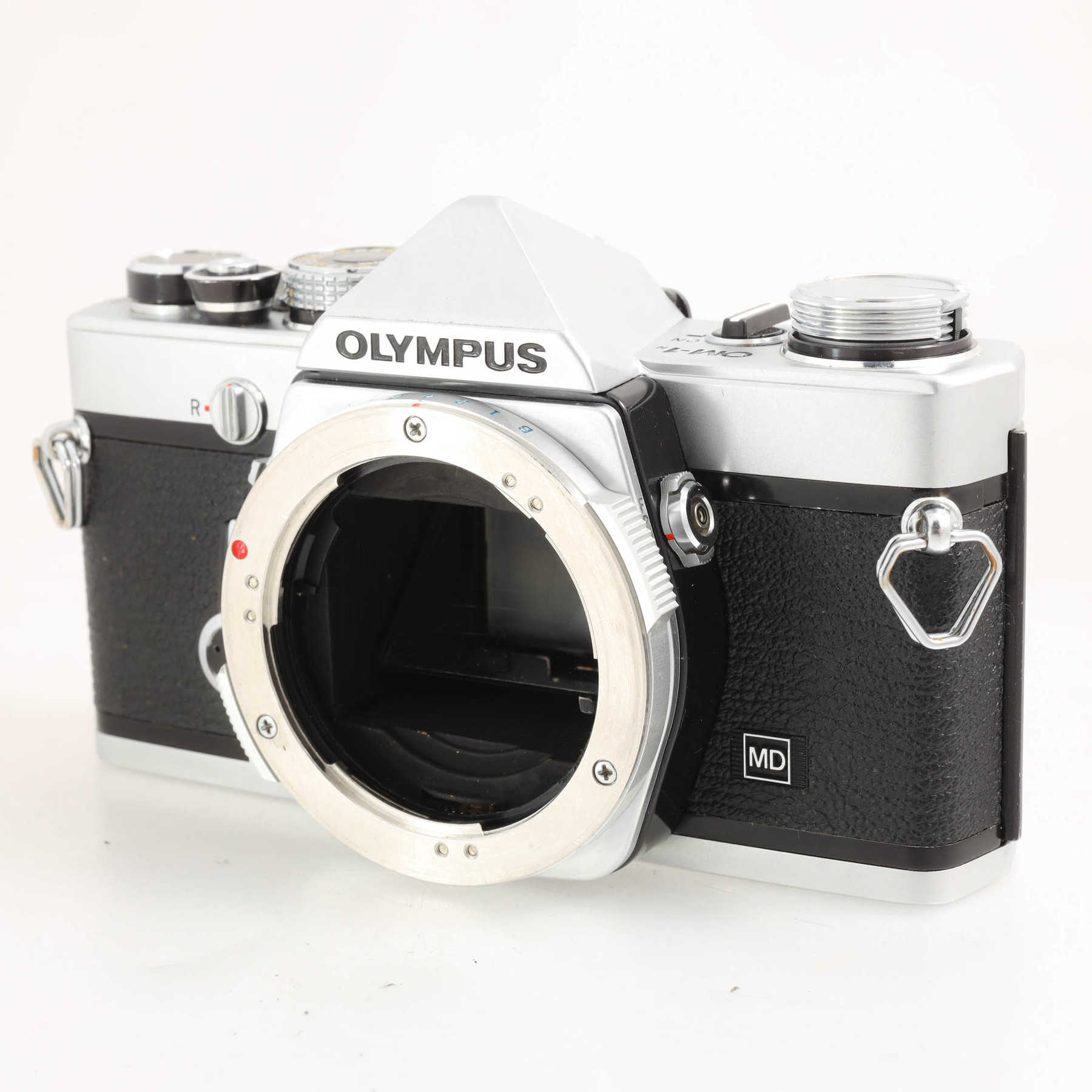 Olympus OM-1n с объективом 50mm f/1.4 G.Zuiko Auto-S Olympus OM-1n с объективом 50mm f/1.4 G.Zuiko Auto-S