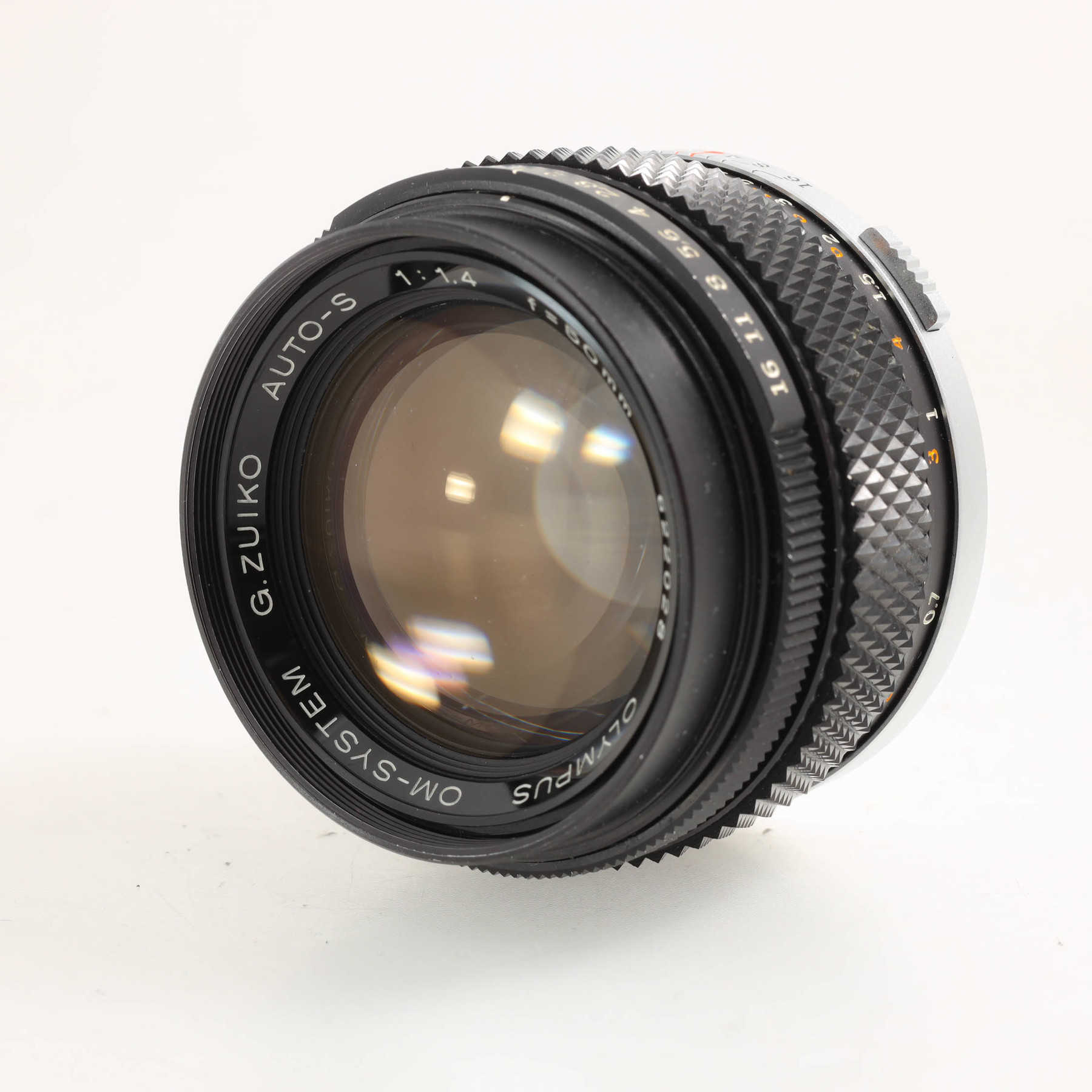 Olympus OM-1n с объективом 50mm f/1.4 G.Zuiko Auto-S Olympus OM-1n с объективом 50mm f/1.4 G.Zuiko Auto-S